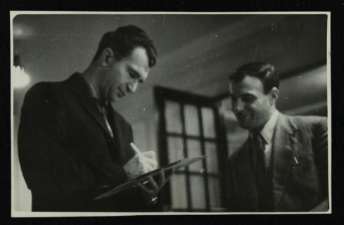 Dave Brubeck signing an autograph, c1950s. Artist: Denis Williams