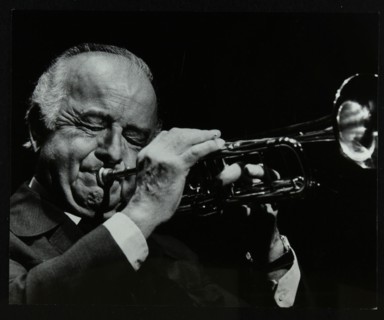 Trumpeter Kenny Baker playing at the Forum Theatre, Hatfield, Hertfordshire, 1978. Artist: Denis Williams