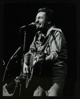 Lonnie Donegan on stage at the Forum Theatre, Hatfield, Hertfordshire, April 1979. Artist: Denis Williams