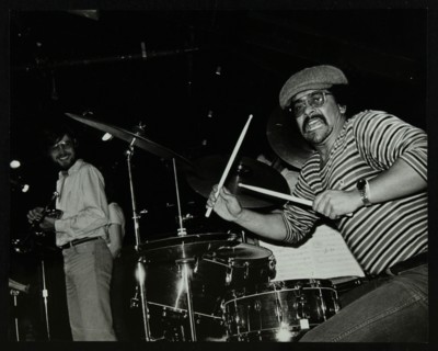 Brian Abrahams (drums) and Guy Barker (trumpet) on stage at The Stables, Wavendon, Buckinghamshire. Artist: Denis Williams