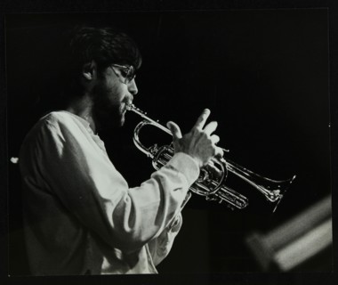 Guy Barker playing the trumpet at The Stables, Wavendon, Buckinghamshire. Artist: Denis Williams