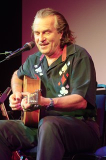 Hans Theessink, Hawth, Crawley, West Sussex, 2014.  Artist: Brian O'Connor.