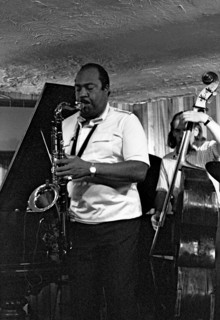 Nathan Davis and Peter Ind, Bass Clef, Hoxton Square, London, August 1987.   Artist: Brian O'Connor.