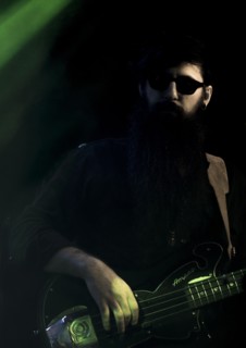 Valerie June's bass player, 2017. Artist: Alan John Ainsworth.