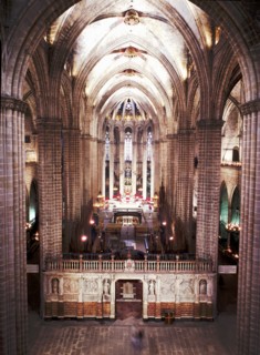 Inside of the Barcelona Cathedral, detail of the main altar and choir of the 13th. Century.