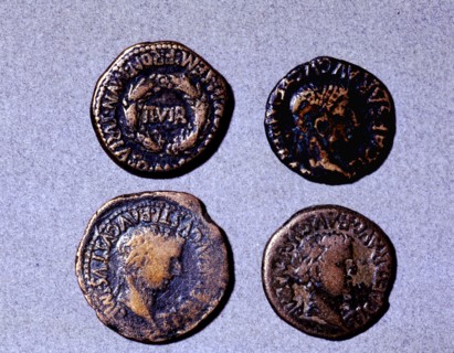 Roman coins from the first half of the first century AC (14-37) and the issuing authority was Tib?