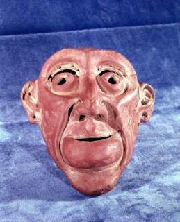 Brest mask made of clay of 14 cm in height, comes from the archaeological site of Tlatilco, in th?