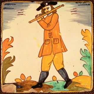 Tiles of the Palmita series, flute musician.