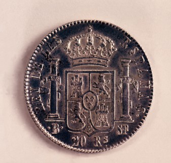 Back of a coin of 20-reales in silver, Ferdinand VII. Mint: Barcelona, 1823.