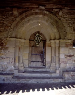 View of the door of the hermitage of San Pelayo, both the door and windows are pointed, the bell ?