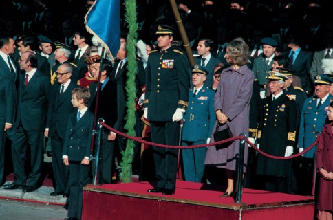Juan Carlos I, King of Spain, with Queen Sofia and Prince Felipe, presiding over a military parad?