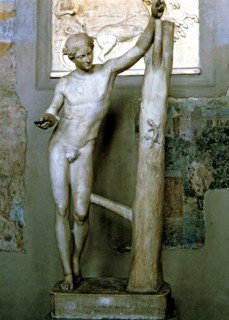 Apollo Sauróctonos, work by Praxiteles preserved in the Vatican Museums .