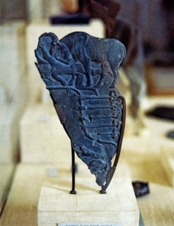 Fragment of a palette with images of a bull charging at an enemy, it comes from Abydos, made in s?
