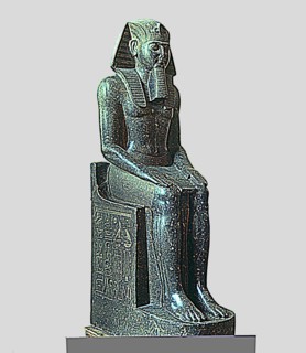 Seated statue of Ramses II, made in diorite, side view, it comes from Tanis.