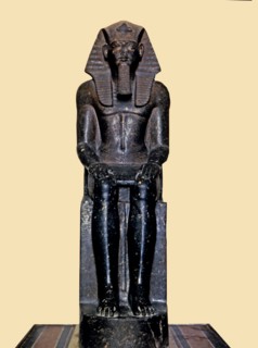 Front view of the seated statue of Ramses II, made in diorite, it comes from Tanis.
