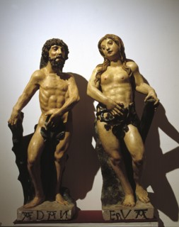 'Adam and Eve', polychromed stone carving.
