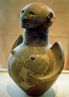 Canope glass depicting a female figure.