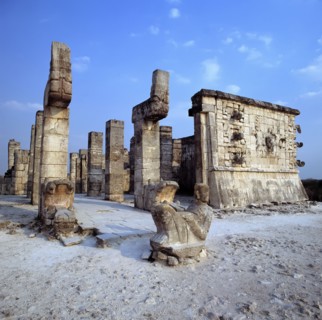 Chichen Itza, view of Temple of the Warriors, with a sculpture in foreground.