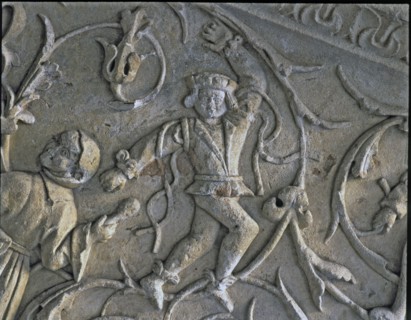 Stairway of the Senior Schools of the University of Salamanca. Detail of the relief of a dancer f?