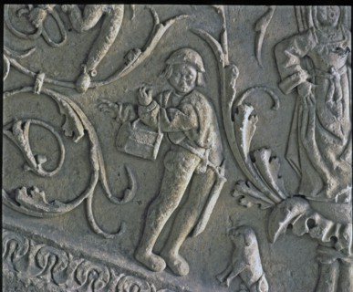 Stairway of the Senior Schools of the University of Salamanca. Detail of the relief of a musician?