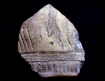 Cardium pottery fragment with anthropomorphic figures, they seem two persons with arms raised as ?