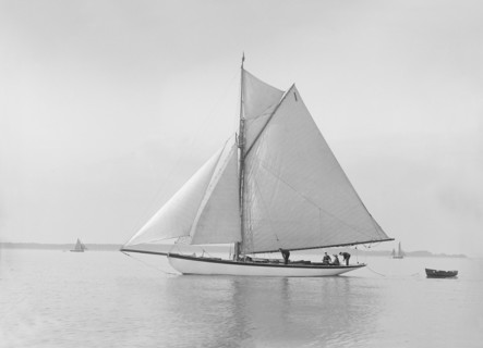 The cutter 'Wenda' in light winds, 1912. Creator: Kirk & Sons of Cowes.