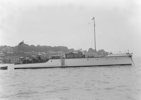 The 12 ton motor yacht 'Cordon Rouge' at anchor, 1923. Creator: Kirk & Sons of Cowes.