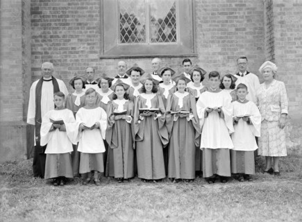 Church officials and choir, (Isle of Wight?), c1935. Creator: Kirk & Sons of Cowes.