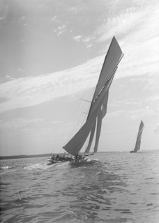 The towering sails of the 15 Metre yacht 'Istria' sailing close-hauled, 1911.  Creator: Kirk & Sons of Cowes.