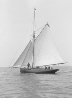 The gaff rigged cutter 'Wych' under sail, 1914. Creator: Kirk & Sons of Cowes.