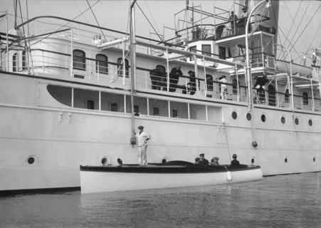 Liberty's motor launch alongside 'Liberty', 1914. Creator: Kirk & Sons of Cowes.
