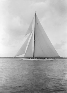 The 23-metre cutter 'Astra' sailing close-hauled. Creator: Kirk & Sons of Cowes.