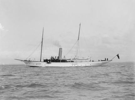 The 70 ton steam yacht 'Ombra' under way, 1914. Creator: Kirk & Sons of Cowes.