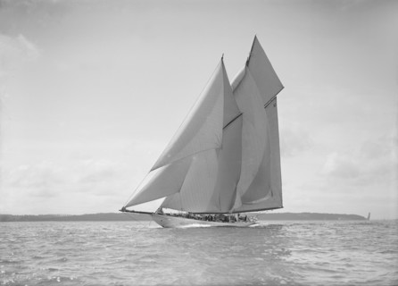 The 250 ton schooner 'Germania' sails close reach, 1911. Creator: Kirk & Sons of Cowes.