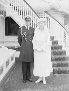 Prince George and Queen Mary aboard 'HMY Victoria and Albert', c1933. Creator: Kirk & Sons of Cowes.