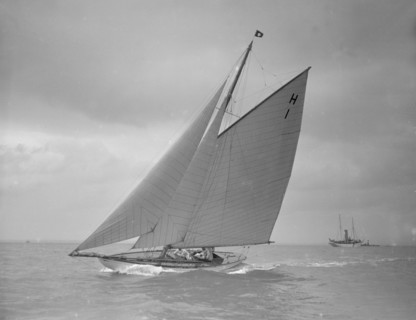 The 8 Metre class yacht 'Norman' (H1) sailing close-hauled, 1911. Creator: Kirk & Sons of Cowes.
