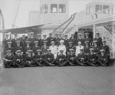 Queen Mary, King George V and crew on board 'HMY Victoria and Albert', 1925.  Creator: Kirk & Sons of Cowes.