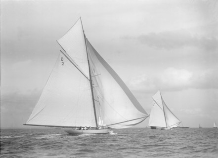 'Ostara' and 'Sophie Elizabeth' racing downwind, 1911. Creator: Kirk & Sons of Cowes.