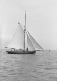 The gaff rigged cutter 'Wych' under sail, 1914. Creator: Kirk & Sons of Cowes.