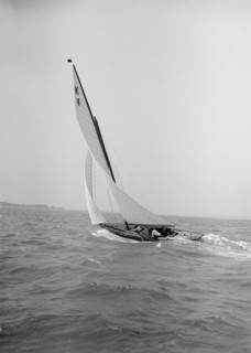 The 7 Metre 'Anitra' sailing with a good wind, 1911. Creator: Kirk & Sons of Cowes.