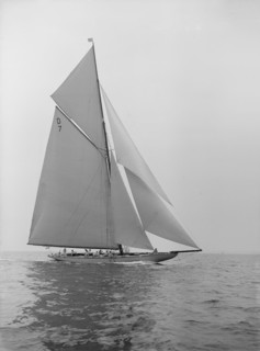 The 15 Metre 'Istria' sailing close-hauled, 1913.  Creator: Kirk & Sons of Cowes.
