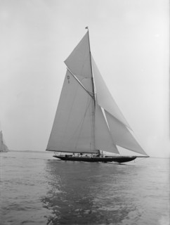 The 15 Metre sailing yacht 'Pamela' sailing close-hauled, 1913. Creator: Kirk & Sons of Cowes.