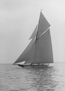 The 15 Metre 'Istria' sailing close-hauled, 1913.  Creator: Kirk & Sons of Cowes.