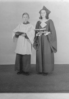 Girl and boy chorister, (Isle of Wight?), c1935. Creator: Kirk & Sons of Cowes.