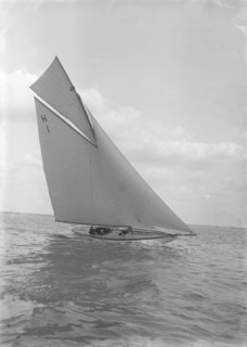 The 8 Metre yacht 'Norman' (H1) sailing close-hauled, 1911. Creator: Kirk & Sons of Cowes.
