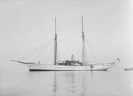 The steam yacht 'Priscilla' at anchor, 1911. Creator: Kirk & Sons of Cowes.