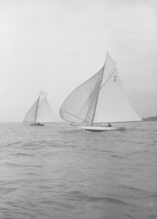The 8 Metre 'Ierne' & 'Gundred' racing downwind, 1913. Creator: Kirk & Sons of Cowes.