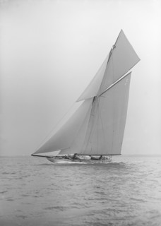 The 19-metre cutter 'Norada' sailing close-hauled, 1913. Creator: Kirk & Sons of Cowes.