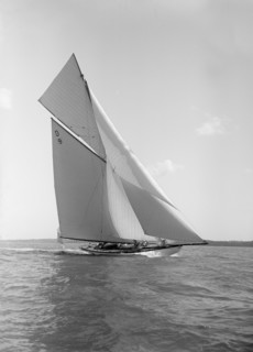 The 15 Metre class sailing yacht 'Tuiga', 1911. Creator: Kirk & Sons of Cowes.