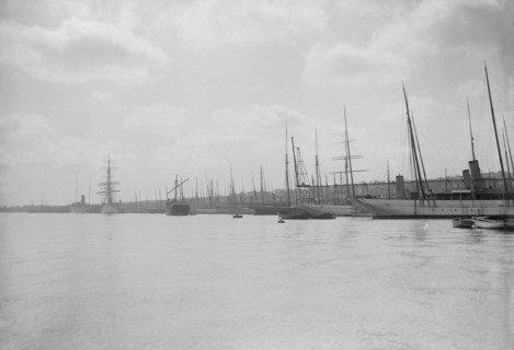 Yachts tying up at Cowes. Creator: Kirk & Sons of Cowes.